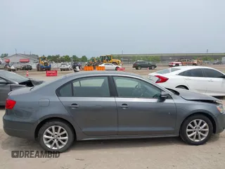 2012 Volkswagen Jetta SE z VIN 3VWDP7AJ2CM009780, wystawiony jako IAAI lot #42501489 z przebiegiem 122 185 mil mil oraz . Historia ofert i sprzedaży dostępna na DreamBid. Obrazek 12.
