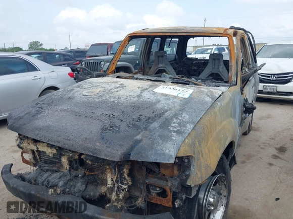 2002 Ford Explorer Sport Value with VIN 1FMYU60E02UB37971, listed as a IAAI auction lot 41936153 with Not provided miles and . Bid and sale history available at DreamBid. Image 2.