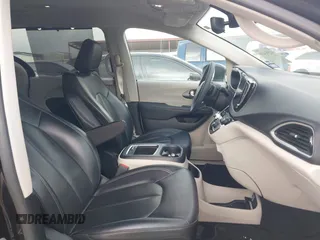 2023 Chrysler Pacifica Touring L with VIN 2C4RC1BG1PR550628, listed as a IAAI auction lot 42553430 with 61,773 mi miles and . Bid and sale history available at DreamBid. Image 5.