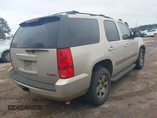 2009 GMC Yukon SLT w/4SA with VIN 1GKEC33379R300278, listed as a IAAI auction lot 41617937 with 240,623 mi miles. Bid and sale history available at carsss.com. Image 4.