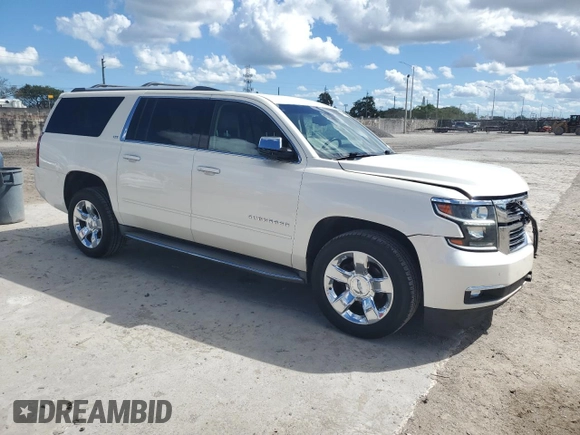 2015 Chevrolet Suburban LTZ with VIN 1GNSKKKC0FR130023, listed as a Copart auction lot 46630825 with 140,057 mi miles and Salvage Title. Bid and sale history available at carsss.com. Image 4.