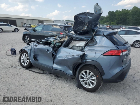2023 Toyota Corolla Cross LE with VIN 7MUCAABG8PV066528, listed as a Copart auction lot 58902095 with 14,190 mi miles and Salvage title. Bid and sale history available at DreamBid. Image 2.