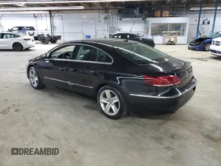 2013 Volkswagen CC Sport z VIN WVWAP7AN3DE517918, wystawiony jako Copart lot #55080285 z przebiegiem 56 408 mil mil oraz Szkody całkowita. Historia ofert i sprzedaży dostępna na DreamBid. Obrazek 2.