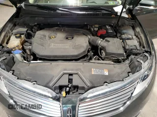 2015 Lincoln MKZ z VIN 3LN6L2J95FR613519, wystawiony jako Copart lot #59165895 z przebiegiem 117 630 mil mil oraz Szkoda całkowita • Salvage title. Historia ofert i sprzedaży dostępna na DreamBid. Obrazek 11.