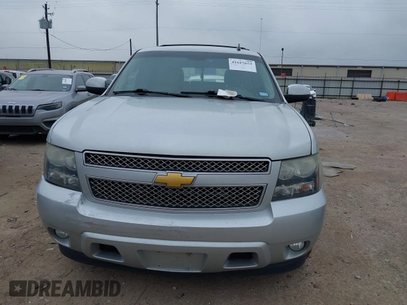 2014 Chevrolet Tahoe LTZ z VIN 1GNSCCE04ER159110, wystawiony jako IAAI lot #41615653 z przebiegiem 171 422 mil mil oraz . Historia ofert i sprzedaży dostępna na DreamBid. Obrazek 12.
