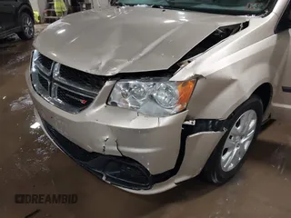 2015 Dodge Grand Caravan SE with VIN 2C4RDGBG2FR592899, listed as a IAAI auction lot 41309499 with 110,428 mi miles and . Bid and sale history available at DreamBid. Image 6.
