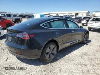 2020 Tesla Model 3 Standard Range Plus with VIN 5YJ3E1EA4LF784677, listed as a Copart auction lot 50515825 with Not Provided miles and Salvage Title. Bid and sale history available at DreamBid. Image 3.