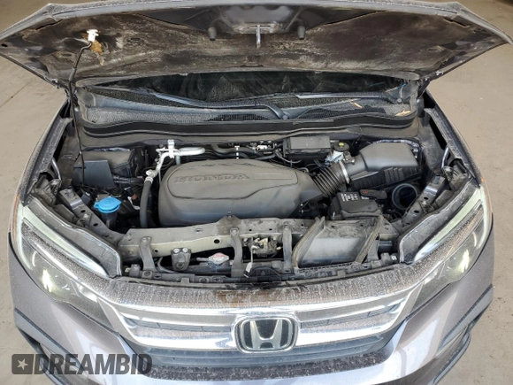 2021 Honda Pilot EX z VIN 5FNYF5H33MB019453, wystawiony jako Copart lot #54769055 z przebiegiem 89 686 mil mil oraz Szkoda całkowita • Salvage title. Historia ofert i sprzedaży dostępna na DreamBid. Obrazek 12.