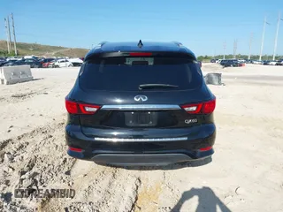 2020 Infiniti QX60 Pure with VIN 5N1DL0MN4LC539573, listed as a IAAI auction lot 42010032 with 104,507 mi miles and . Bid and sale history available at DreamBid. Image 16.