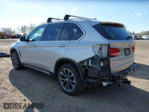 2018 BMW X5 xDrive35i with VIN 5UXKR0C52JL073889, listed as a IAAI auction lot 42035042 with 36,564 mi miles. Bid and sale history available at carsss.com. Image 3.