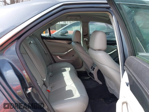 2009 Cadillac CTS RWD z VIN 1G6DF577790133127, wystawiony jako IAAI lot #41810358 z przebiegiem 220 278 mil mil oraz . Historia ofert i sprzedaży dostępna na DreamBid. Obrazek 8.