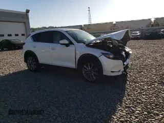 2020 Mazda CX-5 Grand Touring with VIN JM3KFBDM5L1851734, listed as a Copart auction lot 56729585 with 39,023 mi miles and Salvage title. Bid and sale history available at DreamBid. Image 14.