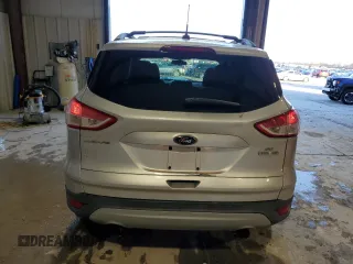 2013 Ford Escape SE with VIN 1FMCU0GX1DUA53319, listed as a Copart auction lot 45741415 with 172,849 mi miles and Salvage Title. Bid and sale history available at DreamBid. Image 6.