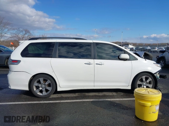 2014 Toyota Sienna SE with VIN 5TDXK3DC1ES422510, listed as a IAAI auction lot 41030376 with Not Provided miles and . Bid and sale history available at DreamBid. Image 14.