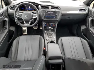 2023 Volkswagen Tiguan SE R-Line Black with VIN 3VV8B7AX4PM072166, listed as a Copart auction lot 86540234 with 21,411 mi miles and Salvage Title. Bid and sale history available at carsss.com. Image 8.