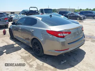 2013 Kia Optima SX with VIN 5XXGR4A67DG199714, listed as a IAAI auction lot 42359527 with 133,636 mi miles and . Bid and sale history available at DreamBid. Image 3.