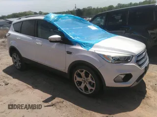 2017 Ford Escape Titanium with VIN 1FMCU0JD8HUE52149, listed as a IAAI auction lot 41974274 with 143,707 mi miles and . Bid and sale history available at DreamBid. Image 1.