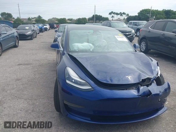 2020 Tesla Model 3 Standard Range Plus with VIN 5YJ3E1EA7LF785838, listed as a IAAI auction lot 41586081 with 38,392 mi miles and . Bid and sale history available at carsss.com. Image 12.