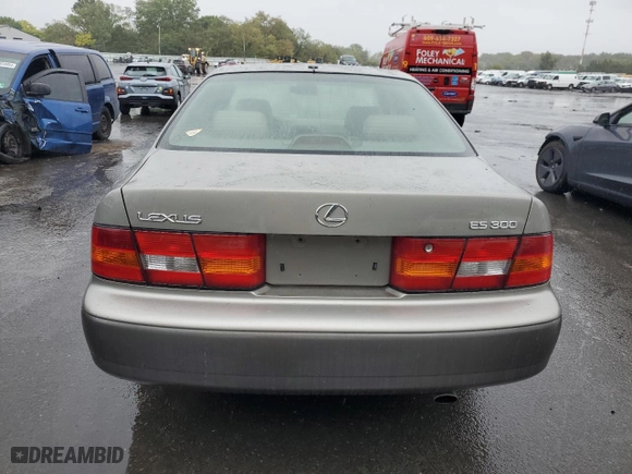 1999 Lexus ES 300 Luxury Sport Sdn with VIN JT8BF28G4X0221758, listed as a Copart auction lot 72716074 with 152,986 mi miles and Salvage Title. Bid and sale history available at carsss.com. Image 6.