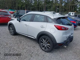 2017 Mazda CX-3 Grand Touring z VIN JM1DKFD70H0159621, wystawiony jako IAAI lot #42331482 z przebiegiem 55 166 mil mil oraz . Historia ofert i sprzedaży dostępna na DreamBid. Obrazek 3.