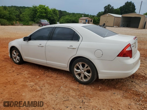 2012 Ford Fusion SE z VIN 3FAHP0HAXCR132060, wystawiony jako Copart lot #56148395 z przebiegiem 172 160 mil mil oraz Czysty tytuł • Clean title. Historia ofert i sprzedaży dostępna na DreamBid. Obrazek 2.