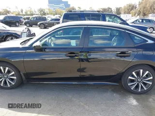 2023 Honda Civic Sedan EX with VIN 2HGFE1F75PH324493, listed as a IAAI auction lot 41692213 with 14,026 mi miles. Bid and sale history available at carsss.com. Image 14.
