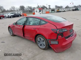 2023 Tesla Model 3 z VIN 5YJ3E1EA4PF384642, wystawiony jako IAAI lot #41496074 z przebiegiem 10 860 mil mil oraz . Historia ofert i sprzedaży dostępna na DreamBid. Obrazek 3.