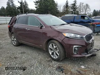 2020 Kia Sorento SX z VIN 5XYPKDA50LG696187, wystawiony jako Copart lot #50215335 z przebiegiem 95 243 mil mil oraz Szkoda całkowita • Salvage title. Historia ofert i sprzedaży dostępna na DreamBid. Obrazek 4.