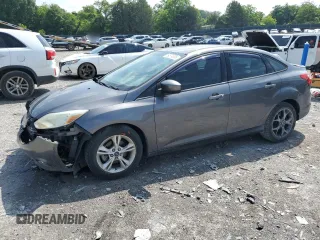 2012 Ford Focus SE with VIN 1FAHP3F20CL461605, listed as a Copart auction lot 59574835 with 119,881 mi miles and Salvage title. Bid and sale history available at DreamBid. Image 1.