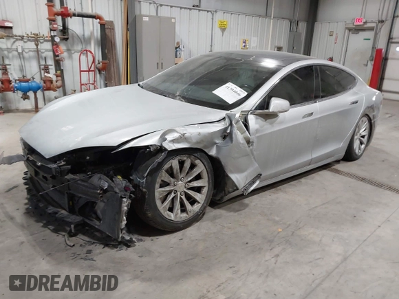 2017 Tesla Model S 100D with VIN 5YJSA1E23HF232059, listed as a IAAI auction lot 41394046 with 84,052 mi miles and . Bid and sale history available at DreamBid. Image 2.