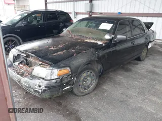 2000 Ford Crown Victoria Police Interceptor z VIN 2FAFP71W4YX199199, wystawiony jako IAAI lot #41610176 z przebiegiem 202 131 mil mil oraz . Historia ofert i sprzedaży dostępna na DreamBid. Obrazek 17.