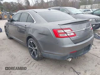 2014 Ford Taurus SHO with VIN 1FAHP2KT0EG171336, listed as a IAAI auction lot 41566688 with 154,328 mi miles. Bid and sale history available at carsss.com. Image 3.