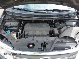 2012 Honda Odyssey EX-L with VIN 5FNRL5H68CB060487, listed as a IAAI auction lot 42176223 with 234,078 mi miles and . Bid and sale history available at DreamBid. Image 10.