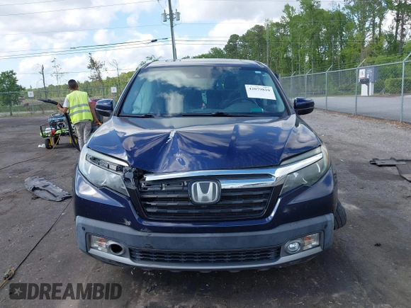 2019 Honda Ridgeline RTL-E with VIN 5FPYK3F76KB010613, listed as a IAAI auction lot 42079810 with 90,492 mi miles and . Bid and sale history available at DreamBid. Image 12.