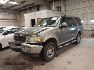 1999 Ford Expedition XLT z VIN 1FMPU18LXXLB47700, wystawiony jako IAAI lot #41592004 z przebiegiem Nie podano mil oraz . Historia ofert i sprzedaży dostępna na DreamBid. Obrazek 2.