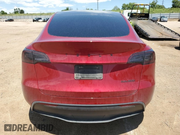 2024 Tesla Model Y Long Range z VIN 7SAYGDEE6RF156183, wystawiony jako Copart lot #61410155 z przebiegiem 27 112 mil mil oraz Szkoda całkowita • Salvage title. Historia ofert i sprzedaży dostępna na DreamBid. Obrazek 6.