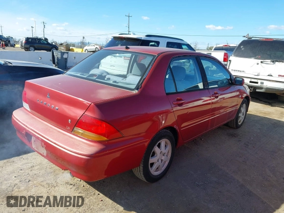 2002 Mitsubishi Lancer LS with VIN JA3AJ36E82U063279, listed as a IAAI auction lot 41711543 with 39,127 mi miles. Bid and sale history available at carsss.com. Image 4.