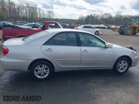 2005 Toyota Camry LE with VIN 4T1BF30K35U608097, listed as a IAAI auction lot 41908838 with 75,601 mi miles and . Bid and sale history available at DreamBid. Image 13.