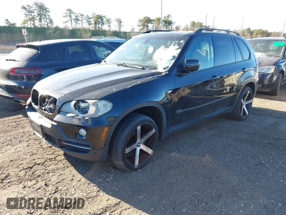 2008 BMW X5 3.0si with VIN 5UXFE43578L036366, listed as a IAAI auction lot 41181561 with 999,999 mi miles. Bid and sale history available at carsss.com. Image 2.