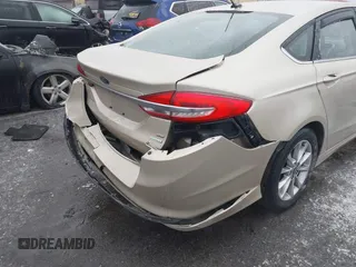 2017 Ford Fusion SE with VIN 3FA6P0HDXHR412215, listed as a IAAI auction lot 41520106 with 100,001 mi miles. Bid and sale history available at carsss.com. Image 6.