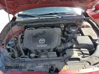2015 Mazda 3 i Grand Touring z VIN 3MZBM1M77FM223990, wystawiony jako Copart lot #54905545 z przebiegiem Nie podano mil oraz Szkoda całkowita • Salvage title. Historia ofert i sprzedaży dostępna na DreamBid. Obrazek 11.