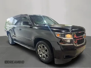 2015 Chevrolet Suburban with VIN 1GNSKJKC6FR60382, listed as a Copart auction lot 63533635 with 216,142 mi miles and Clean title. Bid and sale history available at DreamBid. Image 1.