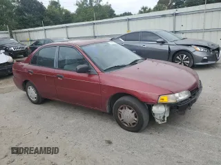 1997 Mitsubishi Mirage DE z VIN JA3AY26AXVU007285, wystawiony jako Copart lot #71958454 z przebiegiem 156 415 mil mil oraz Szkoda całkowita • Salvage title. Historia ofert i sprzedaży dostępna na DreamBid. Obrazek 4.