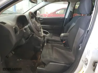 2016 Jeep Compass Sport with VIN 1C4NJDBB7GD646325, listed as a Copart auction lot 47084675 with 105,252 mi miles and Salvage Title. Bid and sale history available at carsss.com. Image 7.