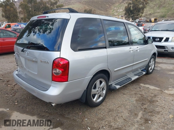 2003 Mazda MPV LX z VIN JM3LW28J730339693, wystawiony jako IAAI lot #41581533 z przebiegiem 56 275 mil mil oraz . Historia ofert i sprzedaży dostępna na DreamBid. Obrazek 4.