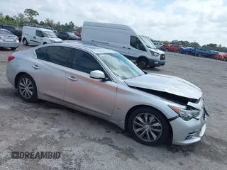 2014 Infiniti Q50 Premium z VIN JN1BV7AP9EM690381, wystawiony jako IAAI lot #41761562 z przebiegiem 107 099 mil mil oraz . Historia ofert i sprzedaży dostępna na DreamBid. Obrazek 1.