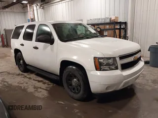 2012 Chevrolet Tahoe Commercial z VIN 1GNLC2E00CR303649, wystawiony jako IAAI lot #41847869 z przebiegiem 92 312 mil mil oraz . Historia ofert i sprzedaży dostępna na DreamBid. Obrazek 1.