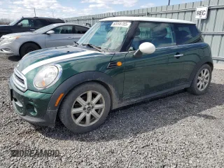 2011 MINI Hardtop with VIN WMWSU3C5XBT183699, listed as a Copart auction lot 52098785 with 150,626 mi miles and Salvage title. Bid and sale history available at DreamBid. Image 1.
