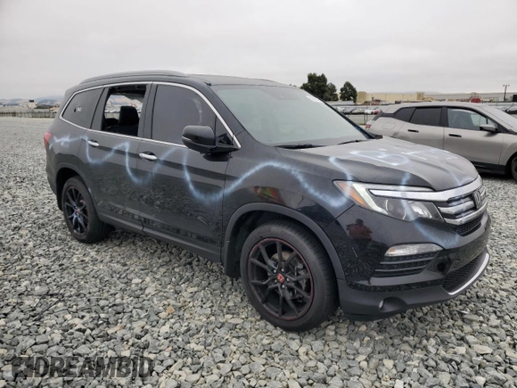 2017 Honda Pilot Elite with VIN 5FNYF6H0XHB019211, listed as a Copart auction lot 62426475 with 69,205 mi miles and Salvage title. Bid and sale history available at DreamBid. Image 4.