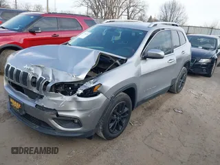 2019 Jeep Cherokee Latitude Plus with VIN 1C4PJLLBXKD123309, listed as a IAAI auction lot 41746458 with 96,353 mi miles. Bid and sale history available at carsss.com. Image 2.